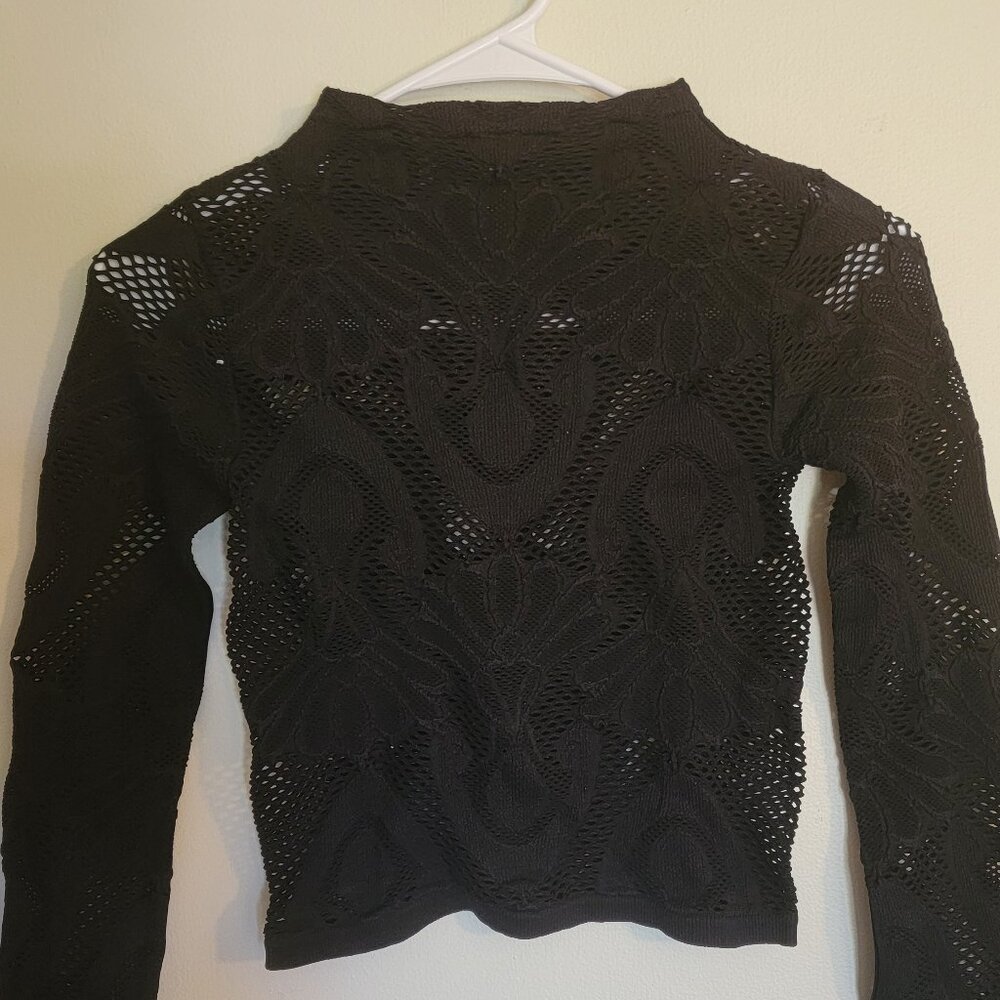 Black long sleeve see through top.
